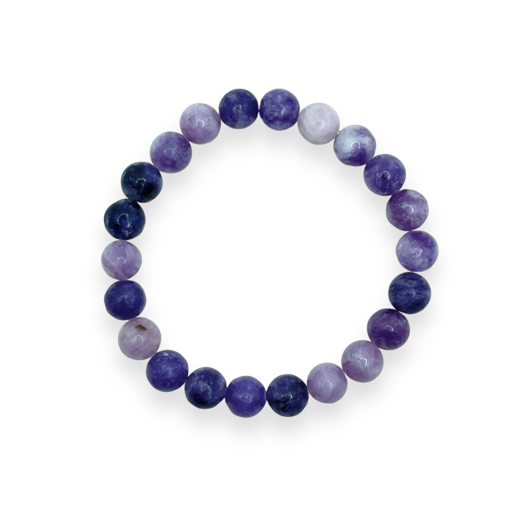 Le bracelet circulaire d'Astellow présente des perles violettes et lavande lisses, mettant en valeur les propriétés apaisantes de la Lépidolite, disposées en nuances alternées sur un fond blanc.